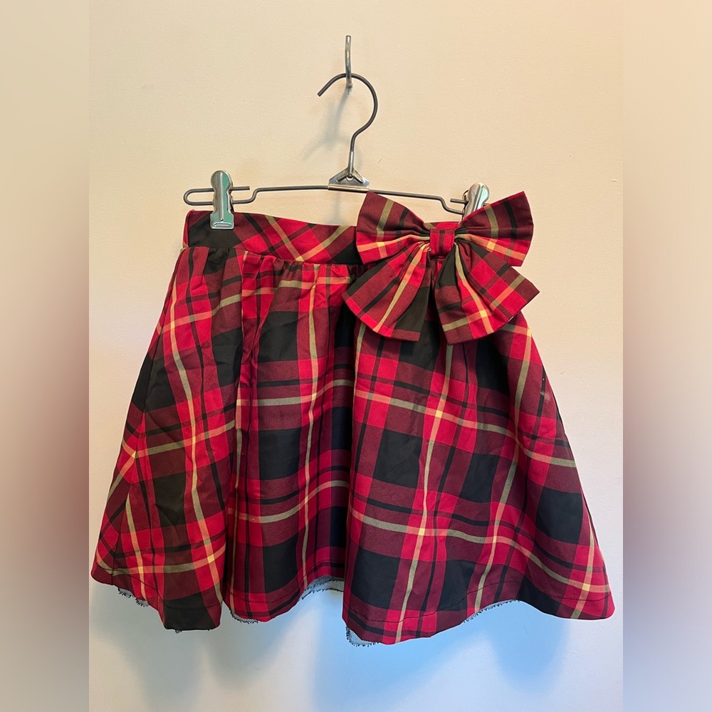 Brand unknown, girls youth plaid skirt with ruffles and bow.
